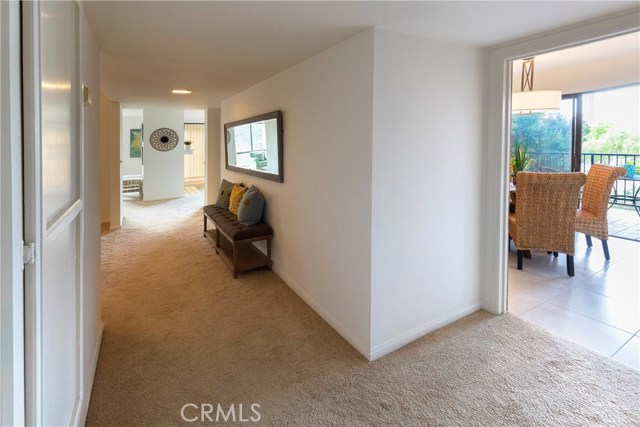 Main Hallway leading into Kitchen to the right.