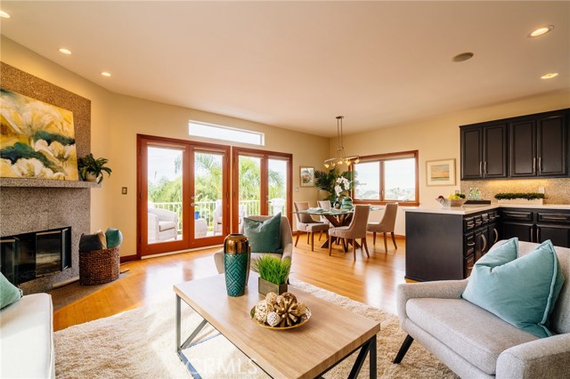 Family room with fireplace, ocean view deck and breakfast area