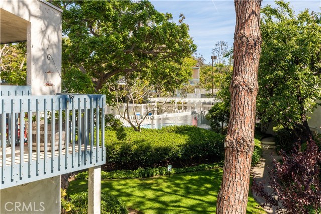 View from your living room balcony. Steps to one of two pools.