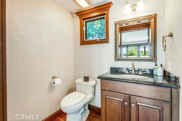 Detached 2nd level space with kitchenette and half bath.