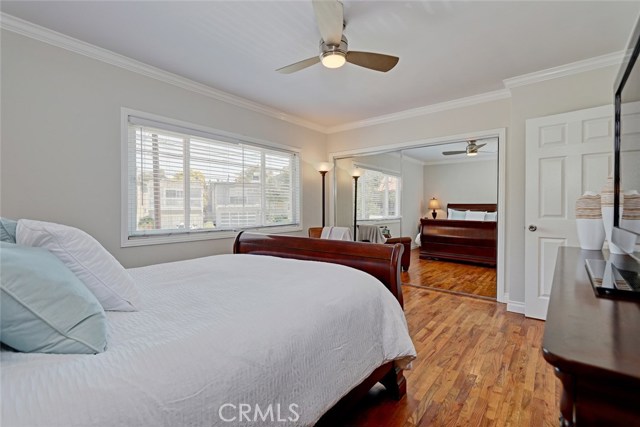 Ceiling fans and mirrored closet doors.