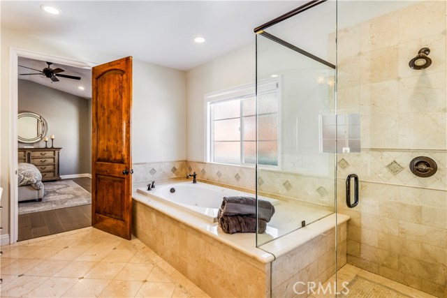 Separate jetted tub and walk-in shower