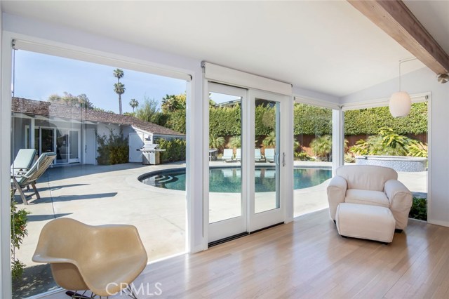 The master bedroom lounge is a most versatile space - a room to relax and enjoy the view of the home's profile and resort-like backyard setting, and room to use however and whenever you want, all to yourself.