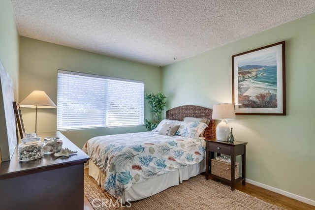 Bedroom with window facing the back yard