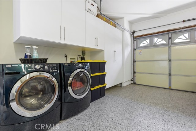 Remodeled Garage with new flooring and Cabinets