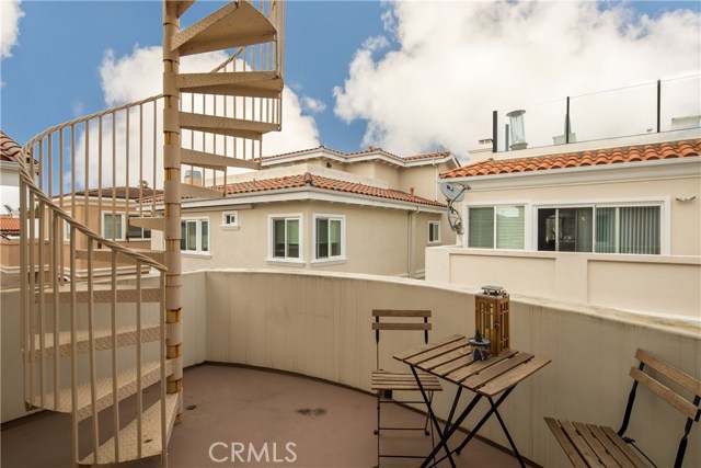 A deck/balcony can be accessed from the living room and mater bedroom. The staircase leads you to the amazing ocean view rooftop deck.