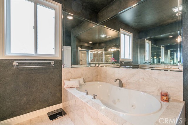 Enjoy a soothing bath in this oversized spa tub