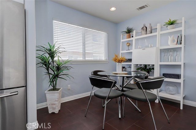 Cozy breakfast nook area and adjacent to the kitchen.