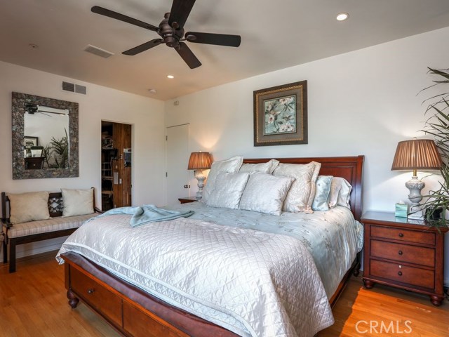 The master bedroom features a cedar-lined walk-in closet, en-suite bath and ocean view patio.