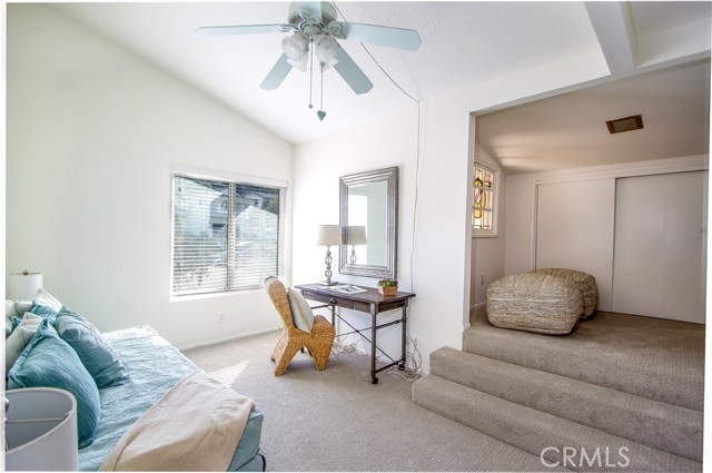 Bedroom #3 upstairs has vaulted ceilings and a fun bonus area.