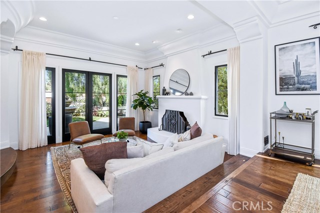 Living room off entry with patio access.