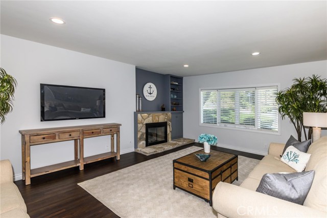 Large family room with fireplace.