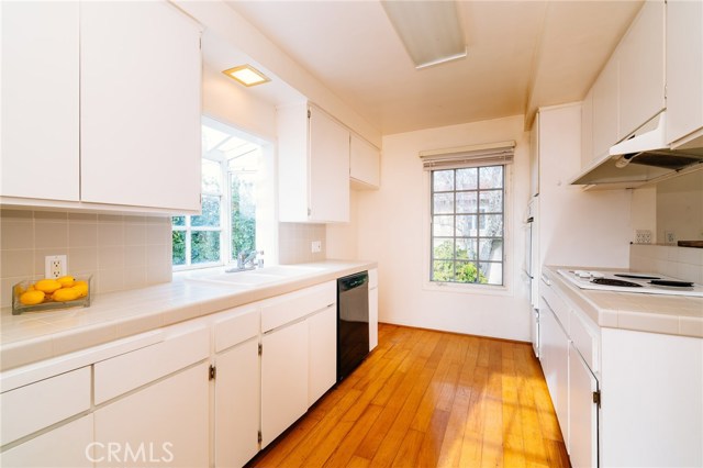 The bright and functional kitchen that it open to the family room and dining area has the potential to be a spectacular living space.