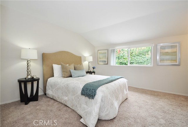 Spacious Master Bedroom with new neutral paint and carpeting.