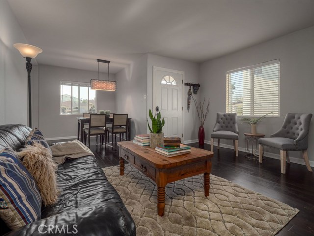 Spacious Living Room - great for entertaining or just relaxing, looking toward front door from hallway.