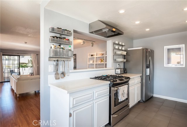 Beautifully remodeled kitchen with stainless steel appliances and recessed lighting!