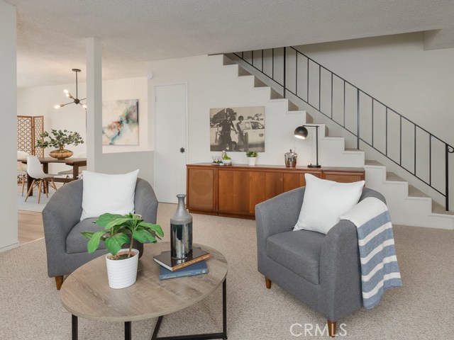 Upon entering, you are welcomed into the Living/Family room area.