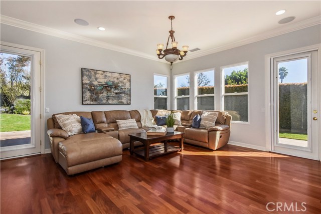 Comfortable Family Room with Fireplace off the Kitchen with views and access to the yard.