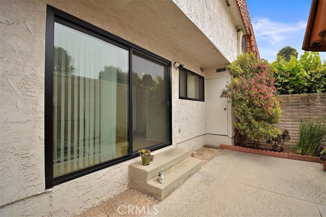 3rd view of patio with enclosed water heater behind door 3rd view of patio with enclosed water heater behind door