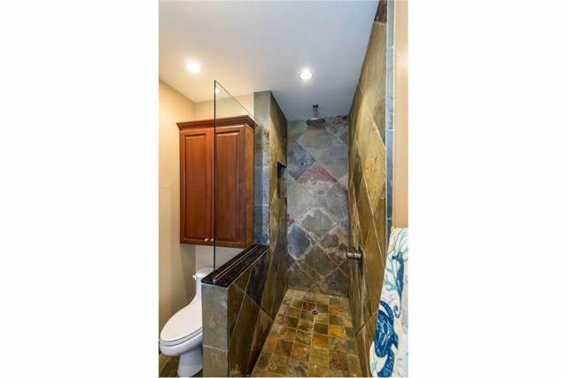 Walk-in slate shower in master suite.