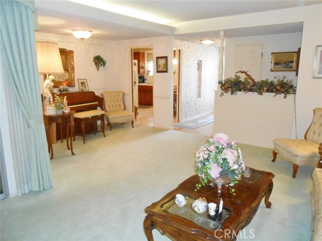 Now more...Angle with a Clearer view of Entry Way and Central Hallway...Probably the Best Seat in the House.