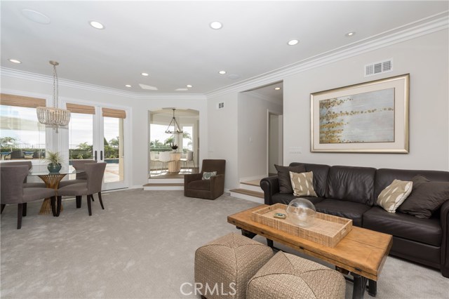 Family room with game/puzzle area and casual eating area beyond!