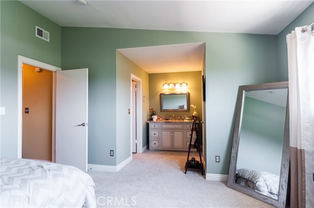 Second Master Bedroom with walk-in closet, nice vanity area.