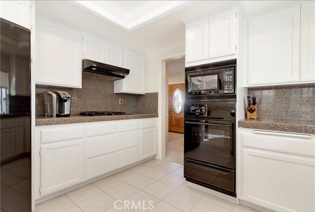 View of the walk through kitchen.