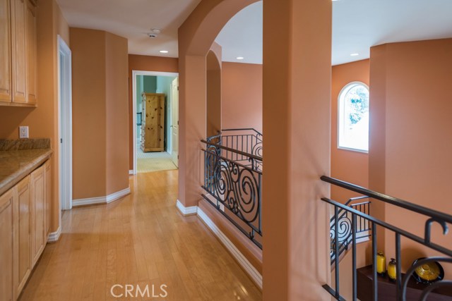 Bright open second floor hallway.