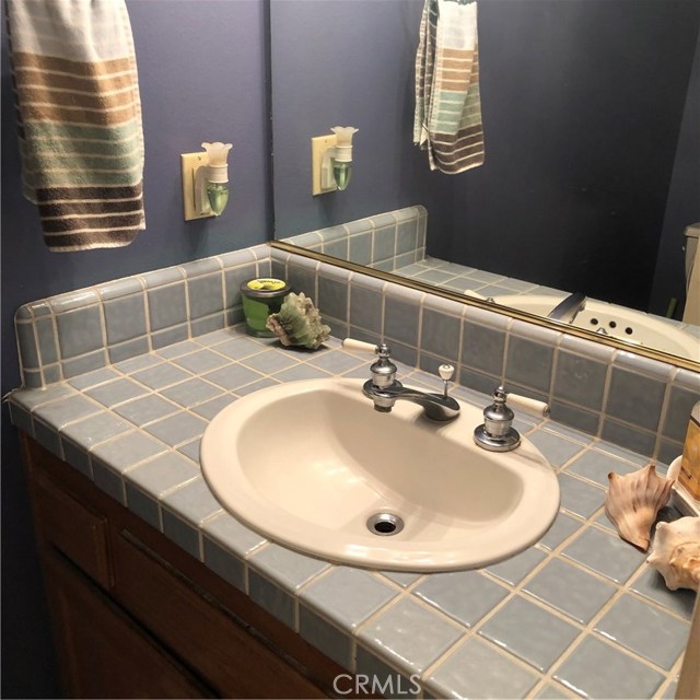 Your guest downstairs half bath...