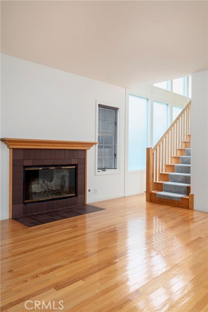 This shot shows you the large East facing wall of Opaque windows designed to allow light into the house and staircase while providing privacy.