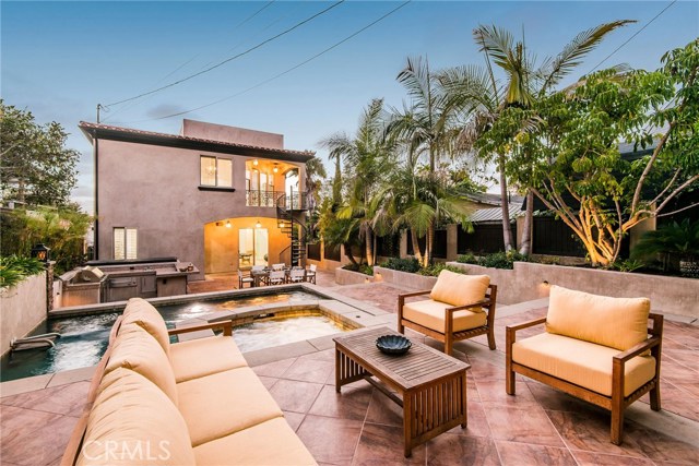 Custom backyard retreat...over $300k was put into this outdoor area, enjoy your weekends and evenings here.  Pool, jacuzzi, dining area, sitting area, fireplace, bbq kitchen suite...you name it it's here.  A rare find in S. Redondo to have so much outdoor space that has so much.