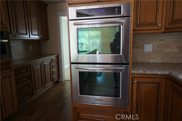 Stainless Double ovens and butlers pantry.