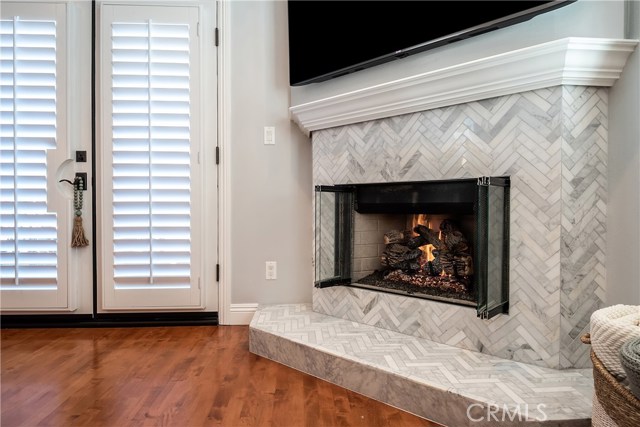 Stunning Carrara marble fireplace to take the chill off after a day on the beach.