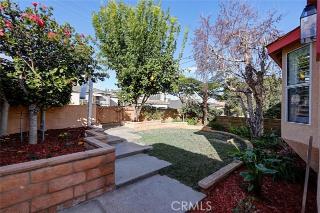 Front yard area with little privacy gate.