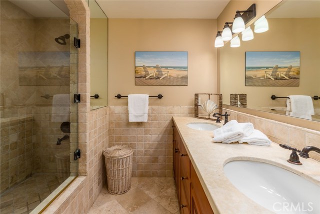 Master bath with double sinks, huge bath/shower, and separate WC