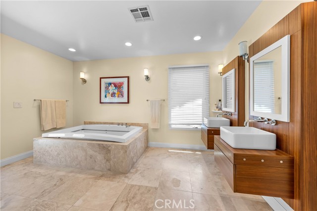 Huge master bathroom with separate soaking tub and steam shower!