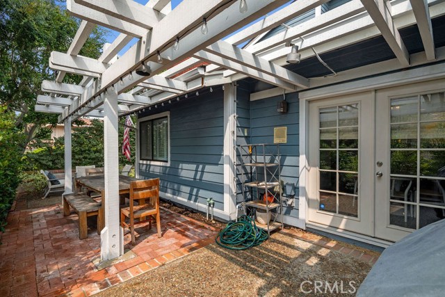 Double doors lead to dining area