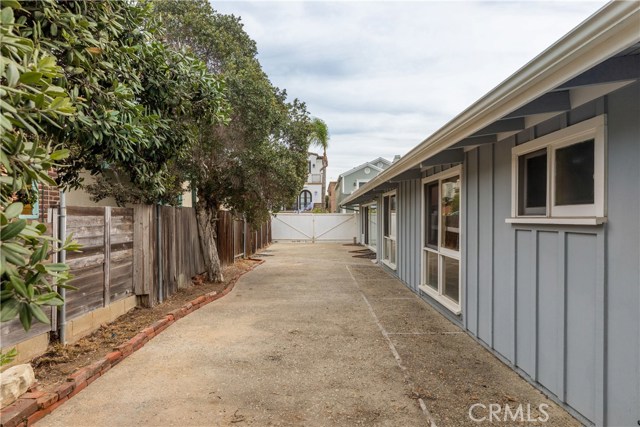 Side yard or RV parking. Street to alley lot.