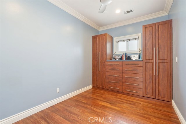2nd floor office with built in wall unit.