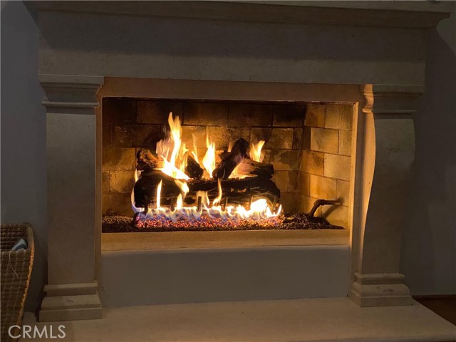 Cozy Fireplace in Living Room With Gas Logs