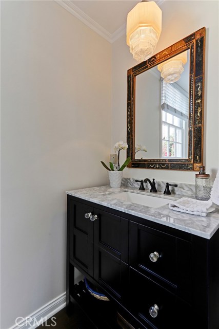 Downstairs Powder Room with Antique Lighting.