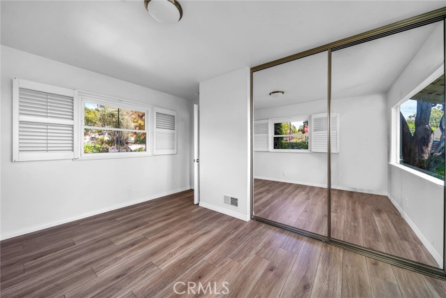 1st floor west bedroom with sliding closet doors