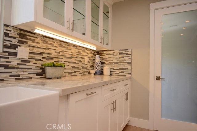 door to mud room/laundry room with pantry