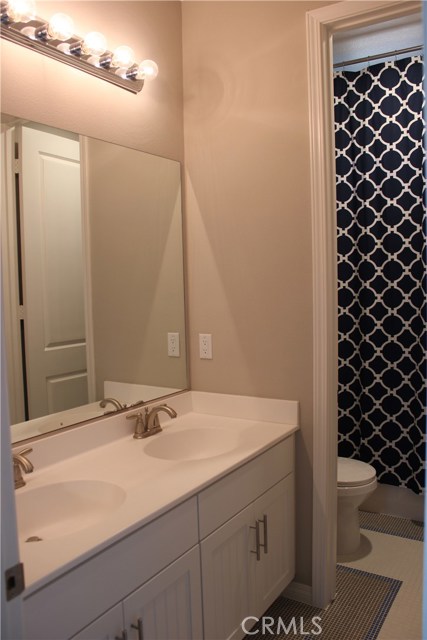 Double sinks and separate shower/bath.