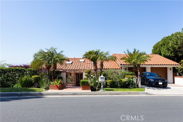 Gated entry from the street adds an element of extra privacy from this street to street lot