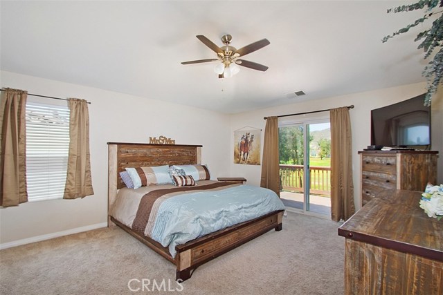 Huge master bedroom suite (that is a king size bed) with balcony  and en-suite bath.