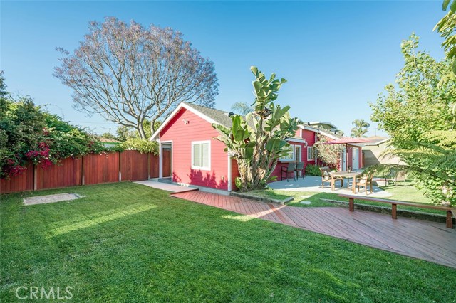 Large back yard perfect for a game of horse shoes, back yard games, entertaining and enjoying a peaceful, private retreat.