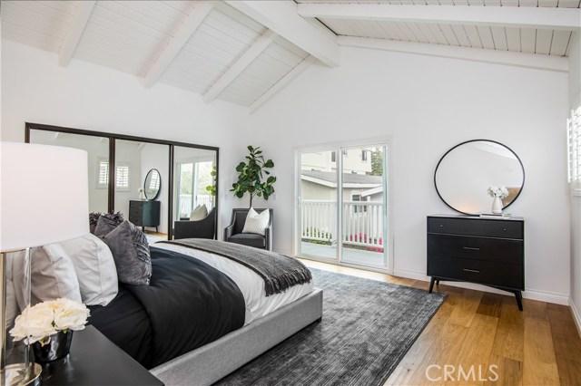 Features private balcony overlooking the backyard area, vaulted ceilings, and engineered french oak hardwood floors