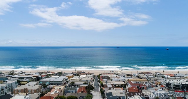 Live just minutes from the sand and enjoy ocean views from multiple balconies.